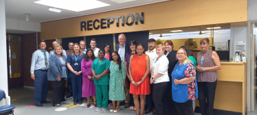 1.	The attached photograph shows John Baron MP with Doctors, Julie Bennett, receptionists, and other members of the team at the Medical Centre.